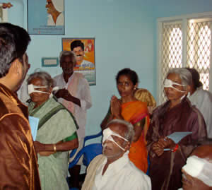 Sri Kaleshwar speaking with surgery patients and their families