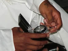 Sri Kaleshwar making a Vaastu calculation on his compass